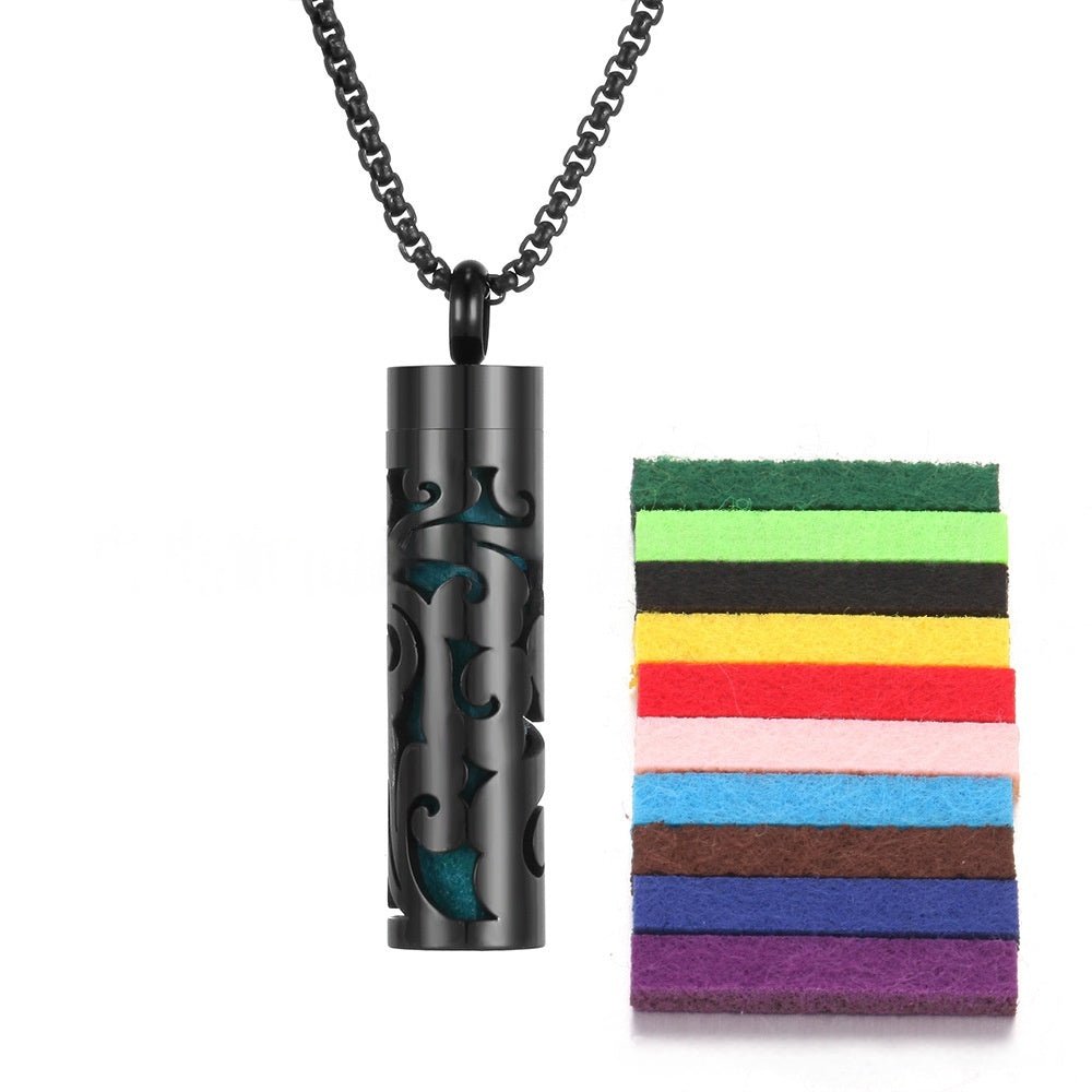 Detail close-up of the stainless steel pendant in black with a necklace chain.