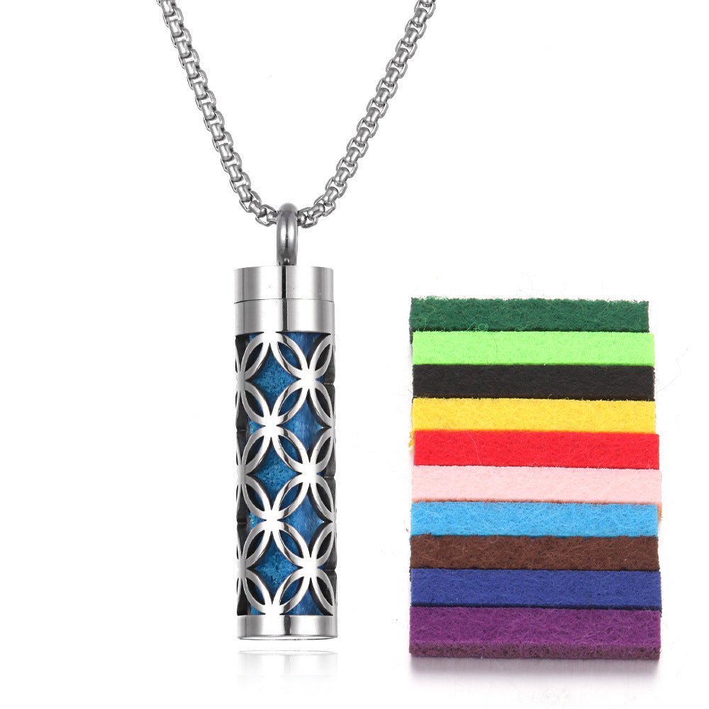 Detail close-up of the stainless steel pendant featuring a bottle design and chain included in silver and blue.
