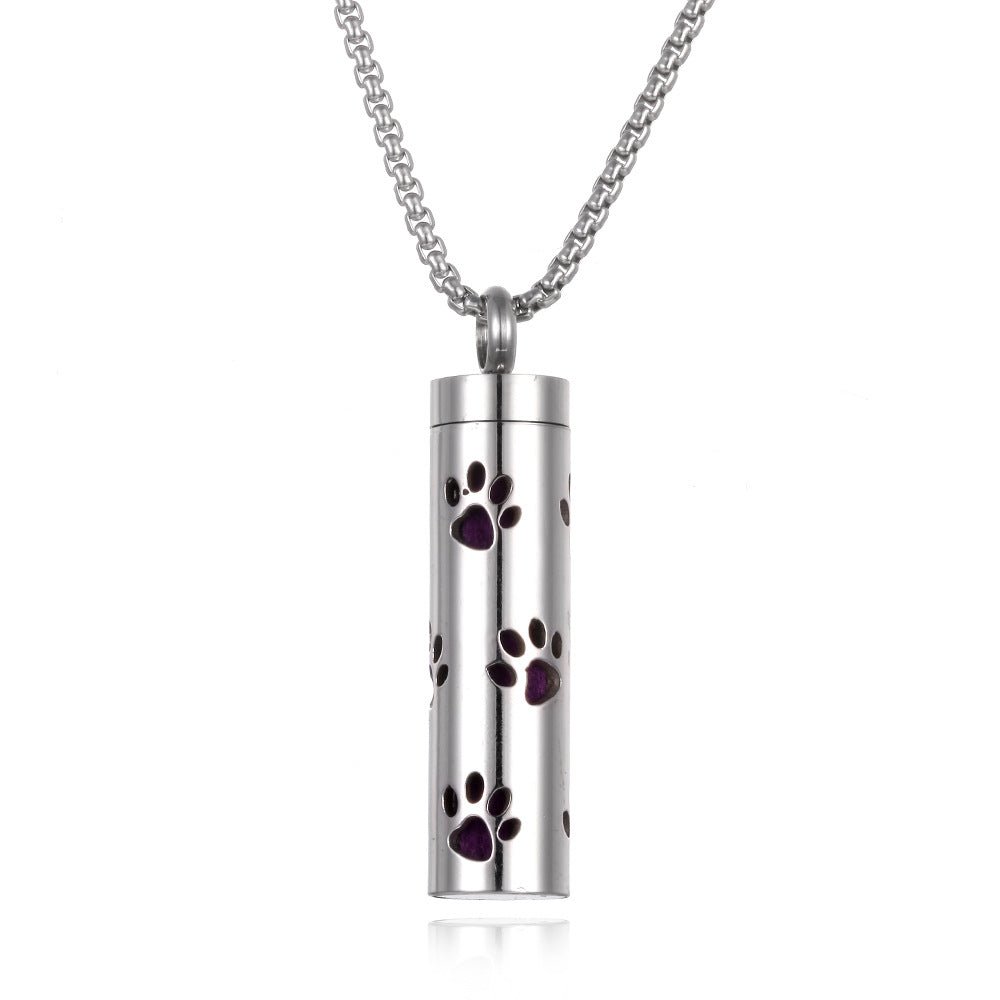 Stainless steel aromatherapy pendant in silver and purple with a chain necklace.