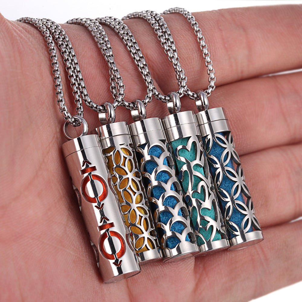 Stainless steel aromatherapy pendant in silver and blue with a chain necklace.