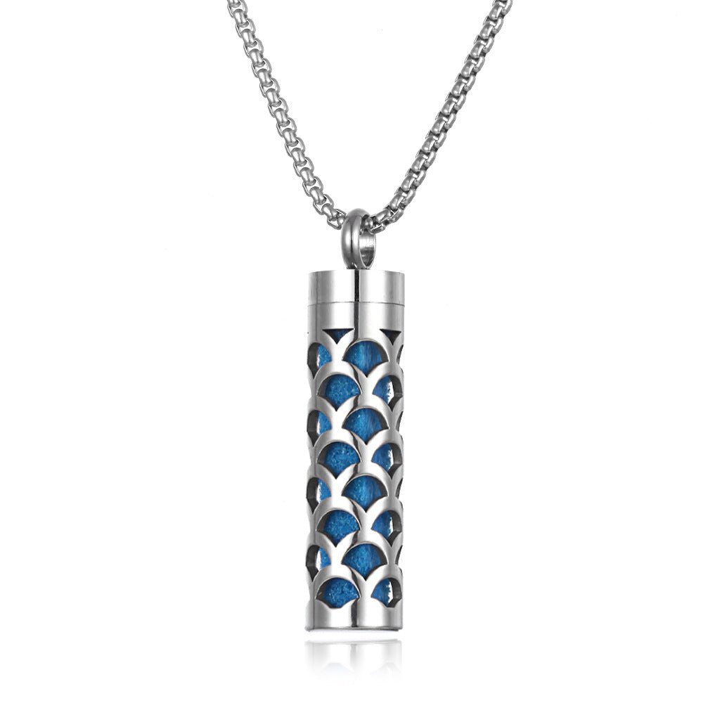 Stainless steel aromatherapy pendant in silver and black with a chain necklace.