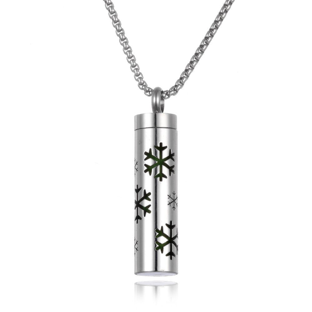 Stainless steel aromatherapy pendant in silver and blue with a chain necklace.