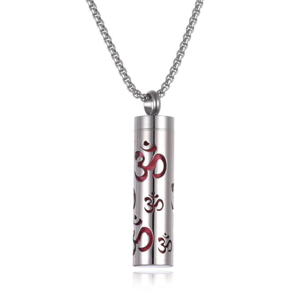 Stainless steel aromatherapy pendant in silver and red with a long chain.