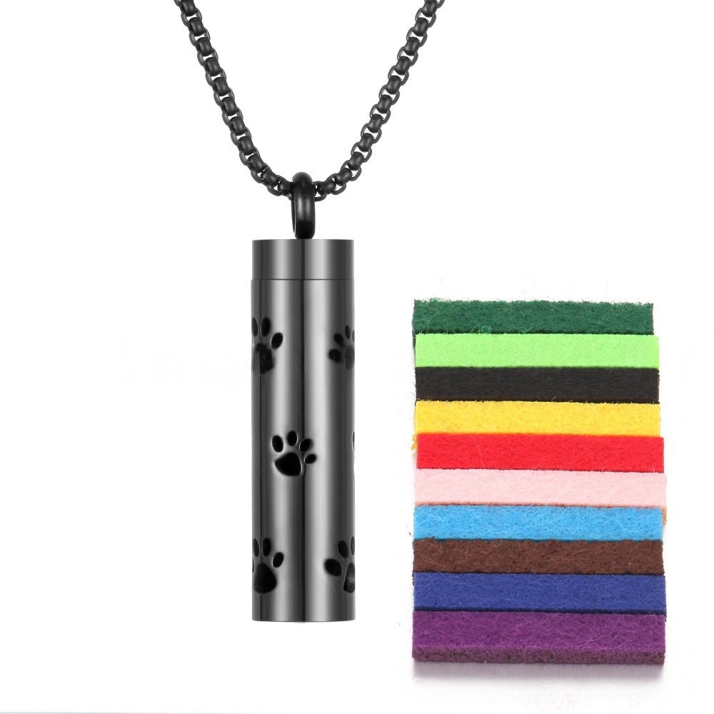 Detail close-up of the stainless steel pendant with colorful bands and a silver necklace chain.