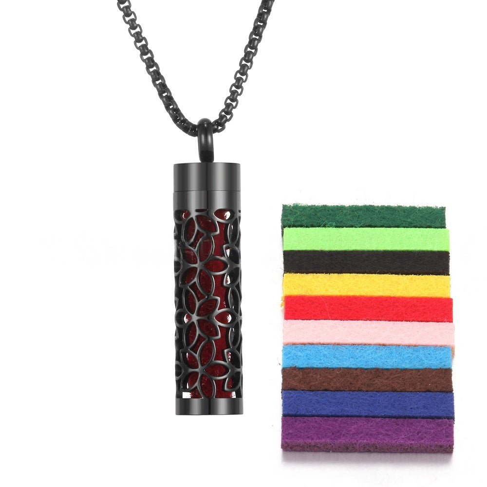 Detail close-up of the stainless steel pendant showcasing red and black colors.