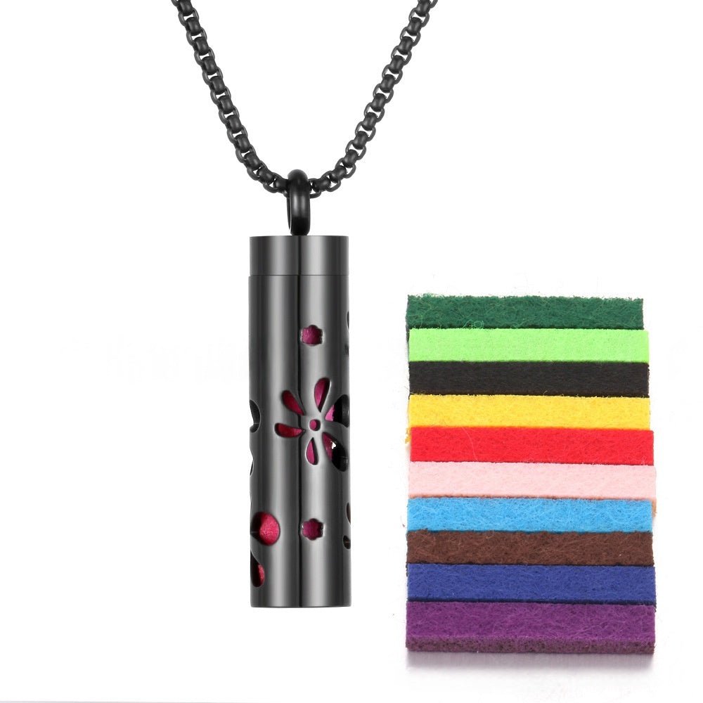 Detail close-up of the stainless steel pendant featuring red and black colorful bands.
