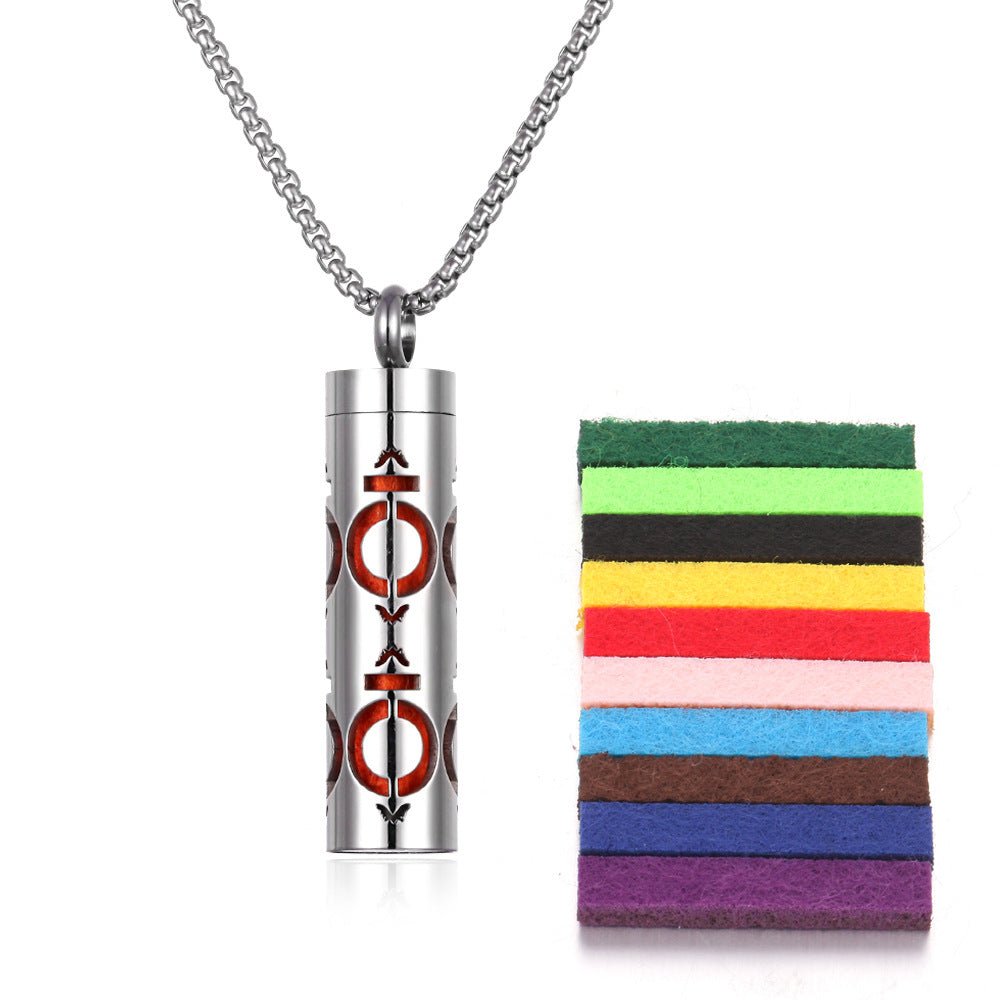 Detail close-up of the stainless steel pendant with a silver and red color scheme.