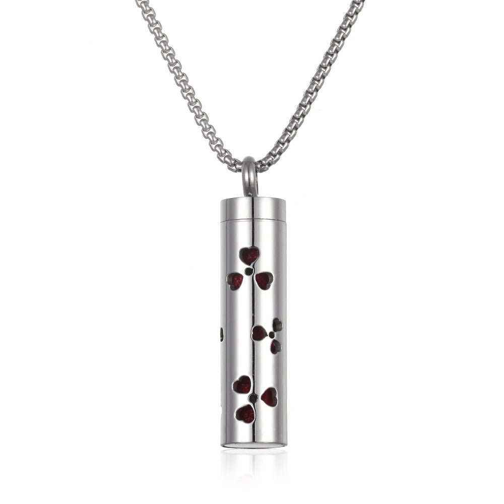 Detail close-up of the stainless steel pendant with colorful bands.