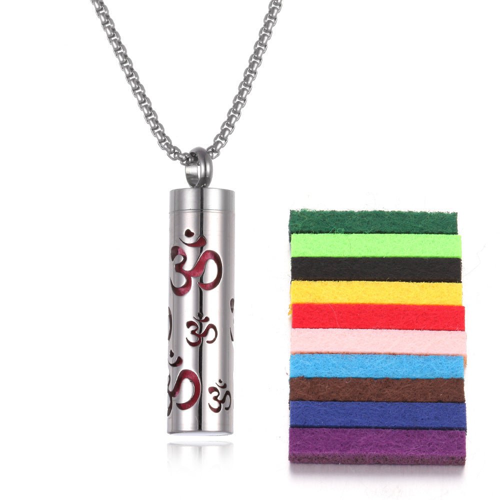 Detail close-up of the stainless steel pendant with a leaf design and colorful pads in silver and multicolor.