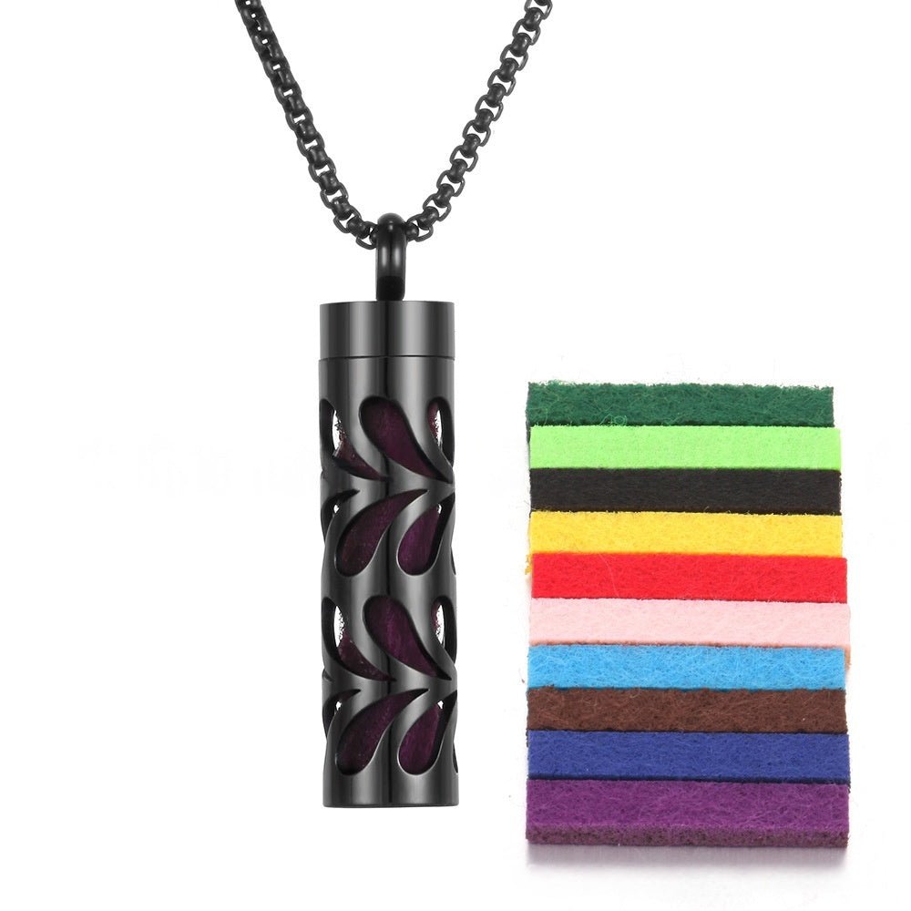 Red stainless steel aromatherapy pendant with chain necklace, lifestyle shot.