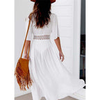 Back view of the white beach skirt showcasing a flowy design, perfect for summer outings.