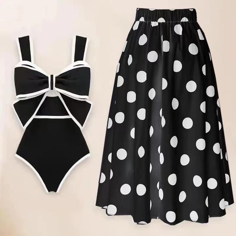 One-Piece Dots Bikini Suit Skirt in black and white with polka dots, side view.