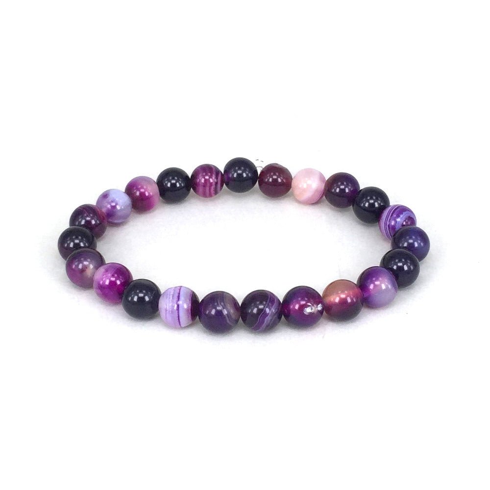 Detail shot of Violet Agate Bracelet with round beads on a transparent background, highlighting its elegant design.