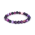 Detail shot of Violet Agate Bracelet with round beads on a transparent background, highlighting its elegant design.