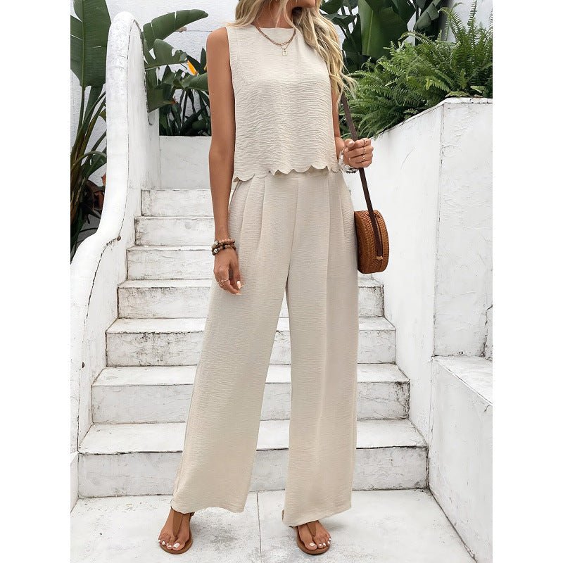 Casual style of apricot and black sleeveless vest and trousers set, emphasizing wide-leg trousers.