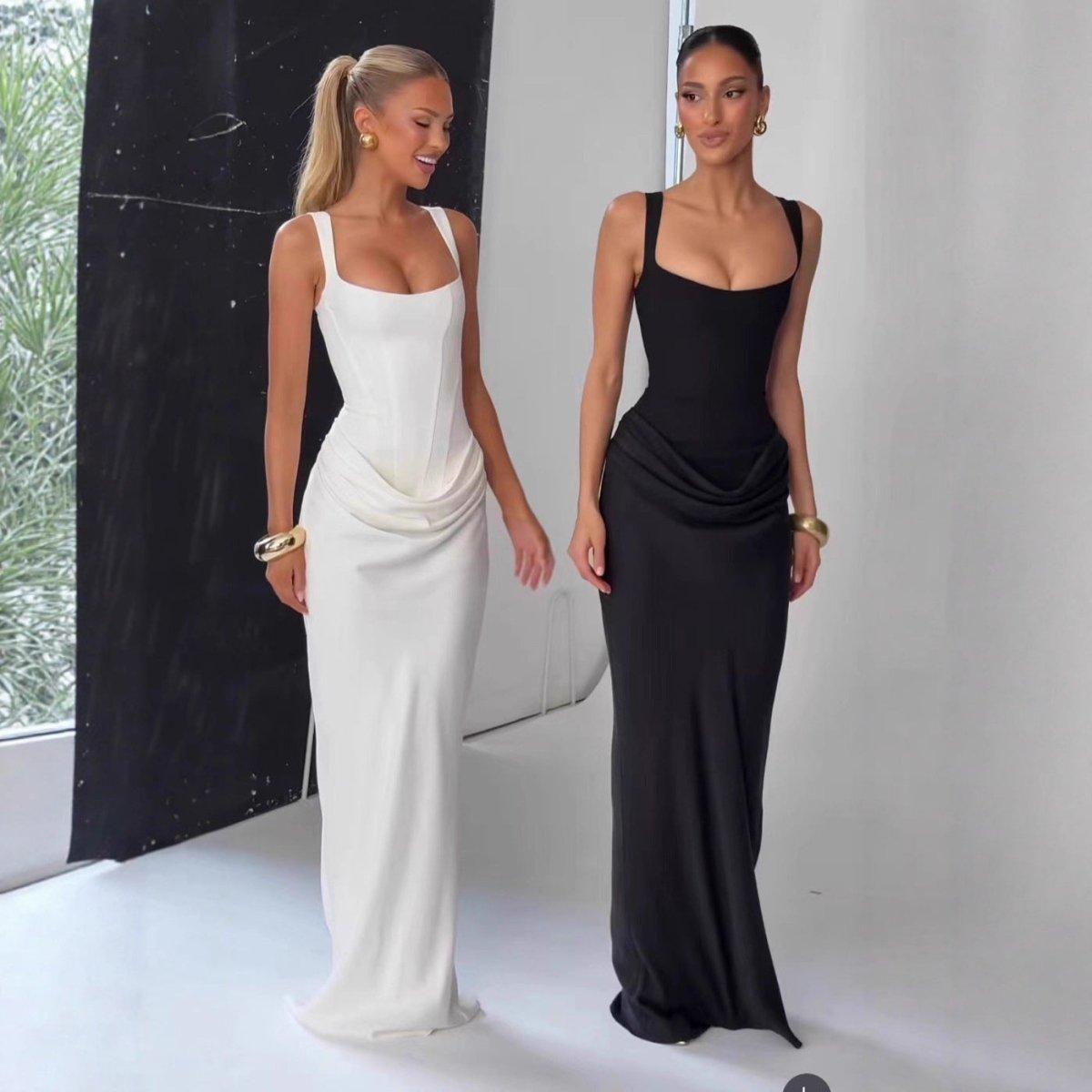 Long white satin strapless slip dress, elegant minimalist style in lifestyle setting