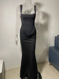 Front view of the chic black slip dress, form-fitting and elegant for a minimalist wardrobe
