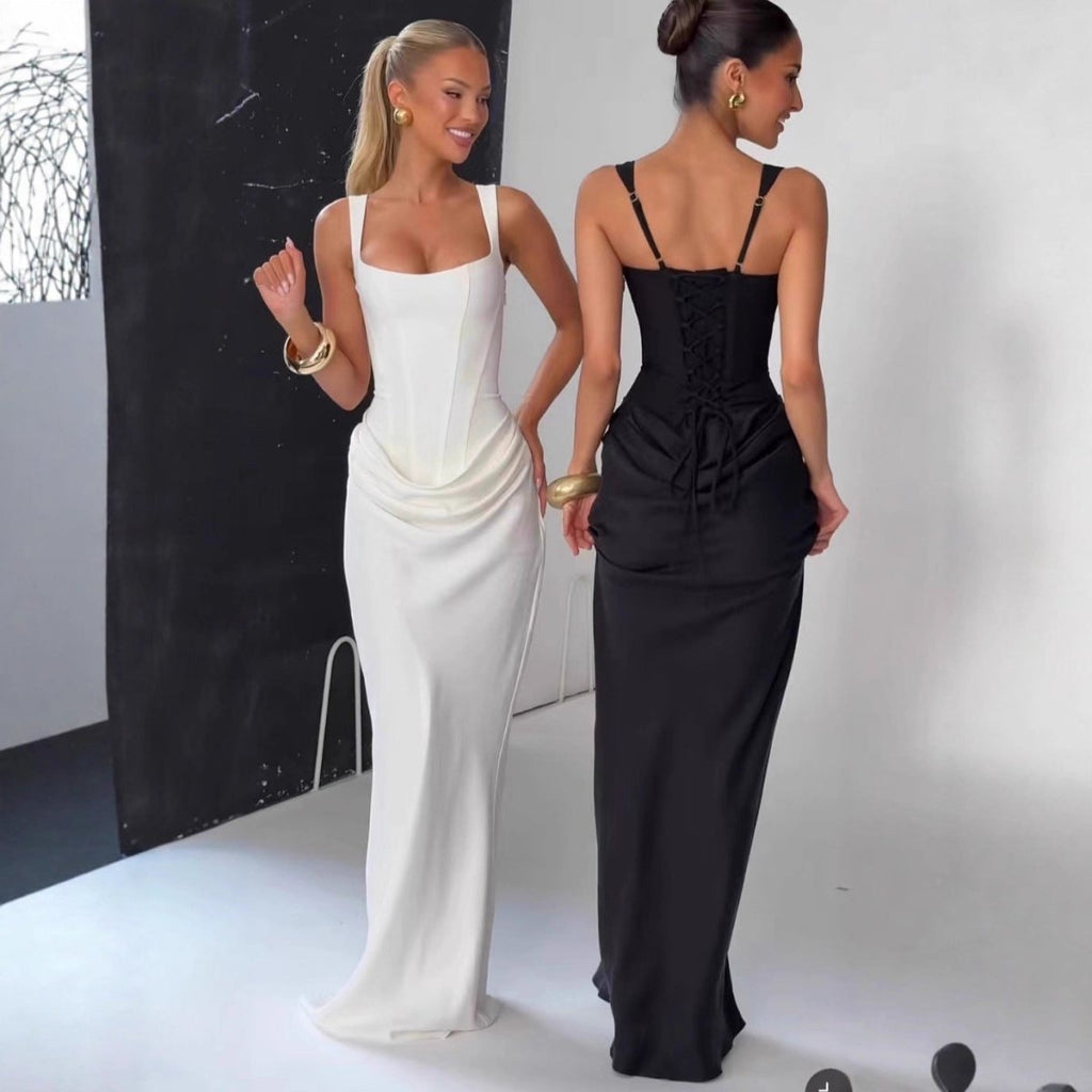 Front view of the long white strapless slip dress, showcasing its elegant minimalist design