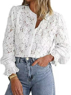 Lifestyle shot of a white lace button shirt showcasing long sleeves and button closure, elegant and versatile design.