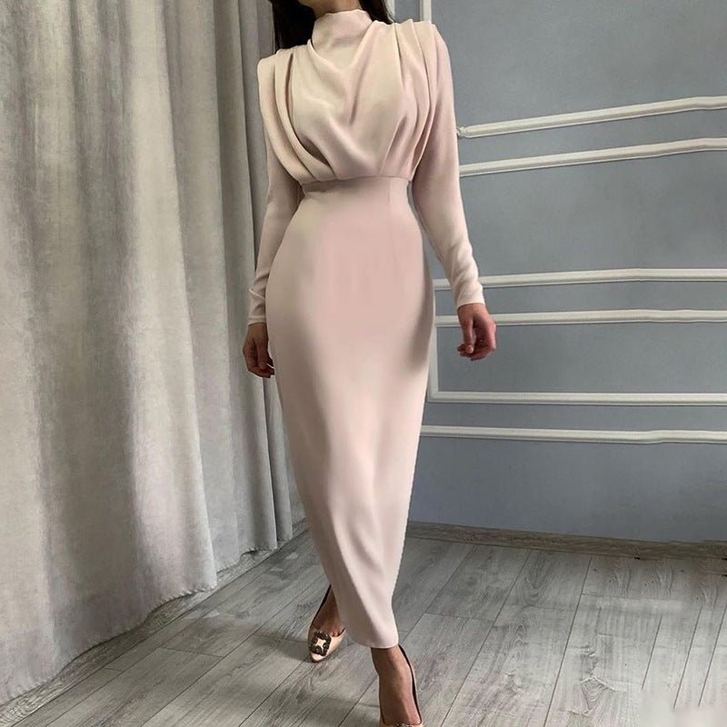 Chic pink draped dress with long sleeves and fitted silhouette, stylish look for various occasions