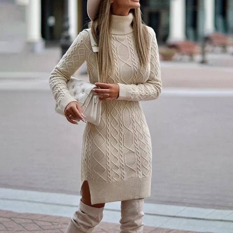 Beige knitted turtleneck dress with side slits, elegant minimalist style in a lifestyle setting.