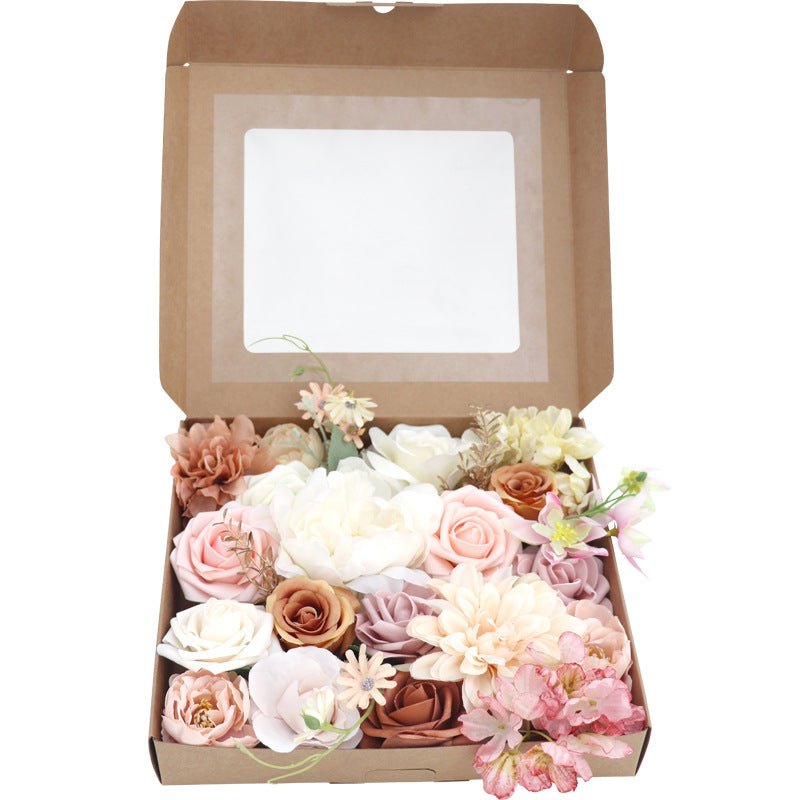 Detail view of the flower arrangement in the Lotus Pink Champagne Rose Box, highlighting various flower types.