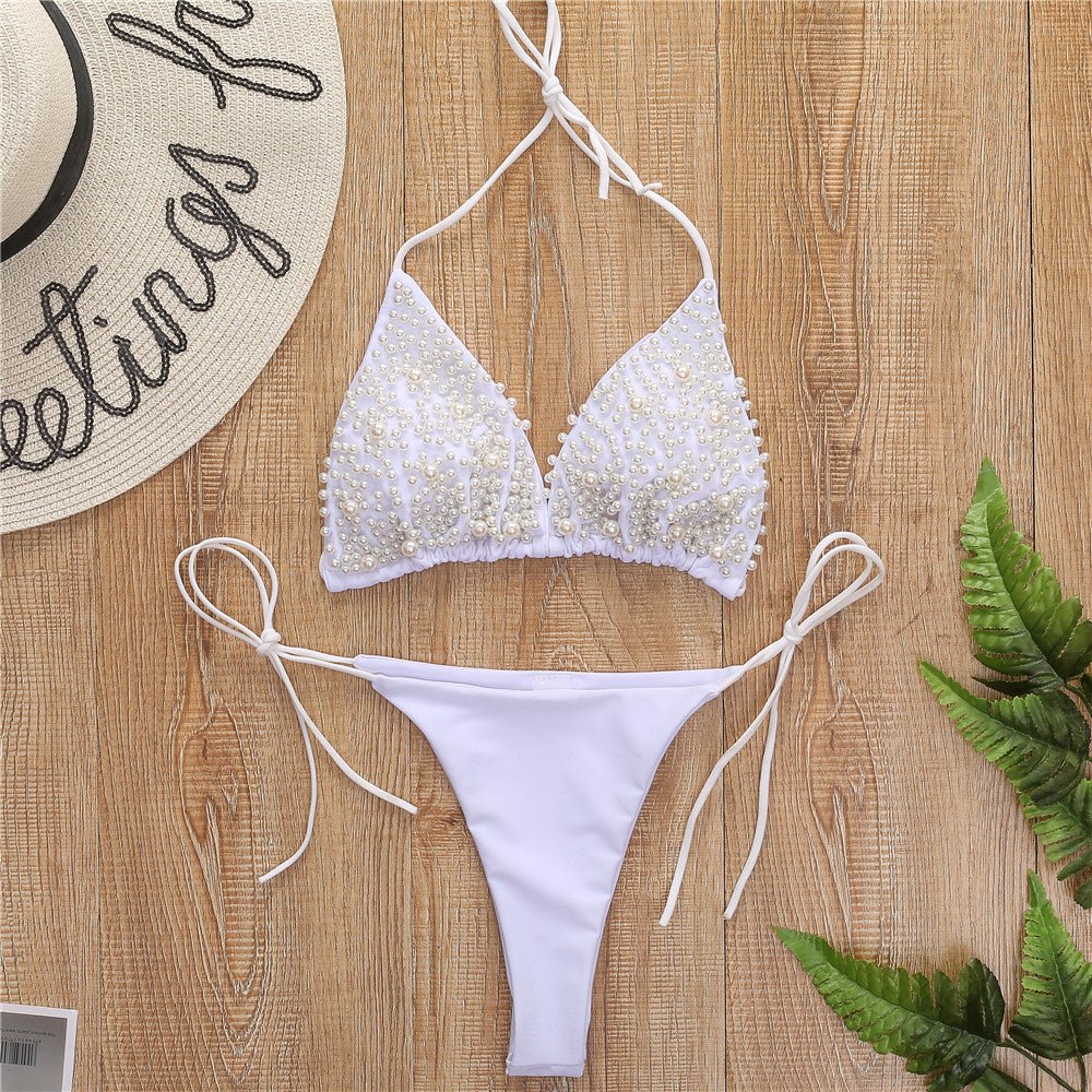 Detail view of the white halter mini bikini swimsuit with triangle cups, showcasing chic fashion details.