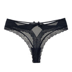 Close-up detail of black lace thong, highlighting sheer fabric and intricate lace trim.