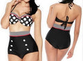 Back view of the red high-waist swimsuit with checkered pattern and bow tie detail.