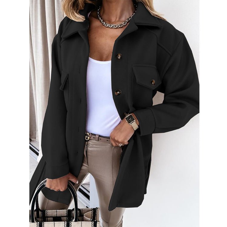 Black oversized lapel jacket with single-breasted design, featured in lifestyle image.