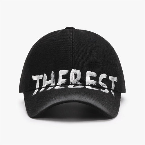 Front view of a black adjustable cotton blend cap featuring graffiti design, chic and stylish.
