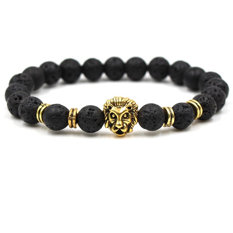 Detail close-up of black stone bracelet with lion head charm, showcasing beaded design on white background