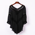 Front view of black crochet cover-up with v-neck and lace details, elegant addition to any wardrobe.