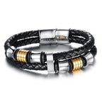 Detail close-up of the black leather hand chain featuring a magnetic buckle and geometric design.