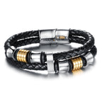 Detail close-up of the leather hand chain showcasing a magnetic buckle in black and gold.