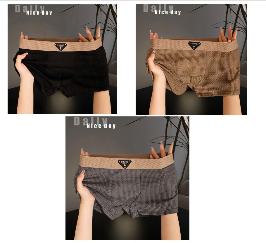 Packaging of men's ice silk boxer briefs in black and white, showcasing soft fabric and variety pack.