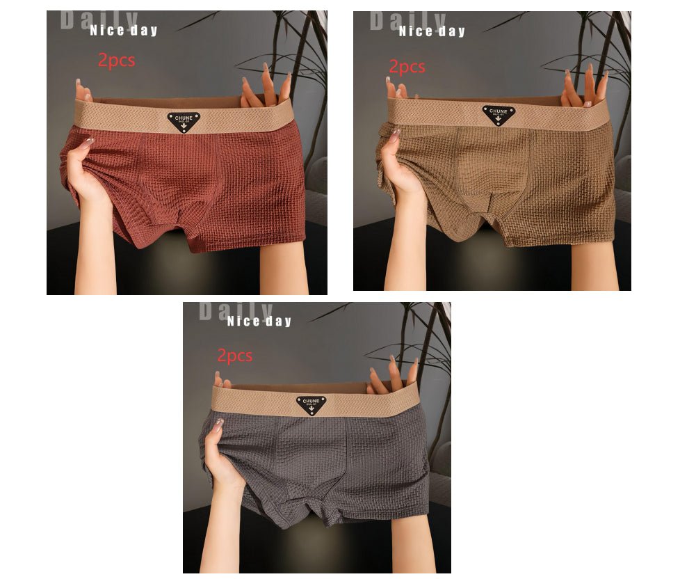Lifestyle shot of boxer briefs in brown, gray, and red, featuring soft fabric and elastic waistband