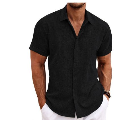 Front view of the black loose-fitting short-sleeved shirt featuring a button-up design, elegant minimalist look.