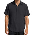 Front view of the dark gray loose-fitting short-sleeved shirt with button-up design, sophisticated minimalist fashion.