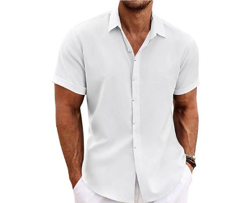 Front view of the white loose-fitting short-sleeved shirt with button-up design, chic minimalist style.