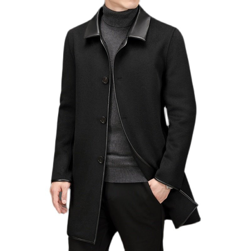 Lifestyle view of a black woolen coat featuring a lapel collar and mid-length cut against a white background.