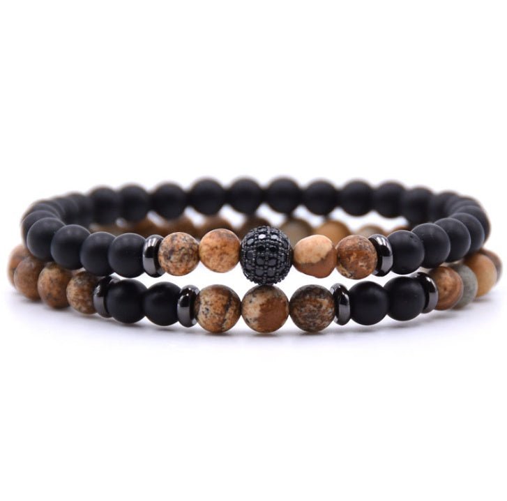 Detail close-up of brown and black natural stone beaded bracelet with micro-inlaid zircon, versatile accessory for any out…