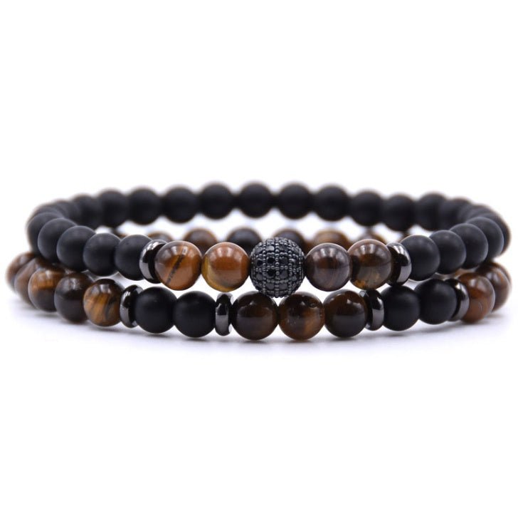 Detail close-up of multicolor beaded bracelet highlighting orange and brown natural stones.