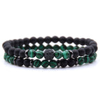 Detail close-up of green and black natural stone beaded bracelet with micro-inlaid zircon, stylish addition to a capsule w…