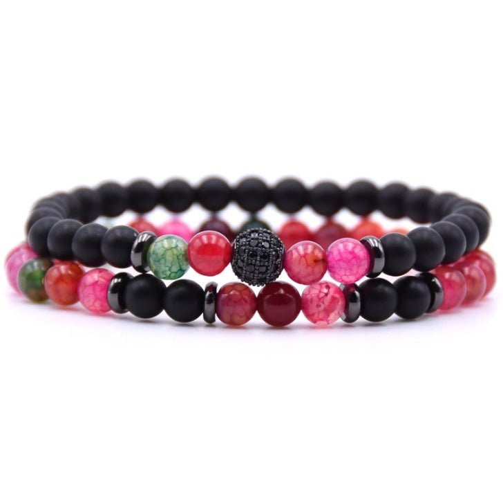 Detail close-up of multicolor natural stone beaded bracelet with micro-inlaid zircon, sophisticated addition to chic fashion.