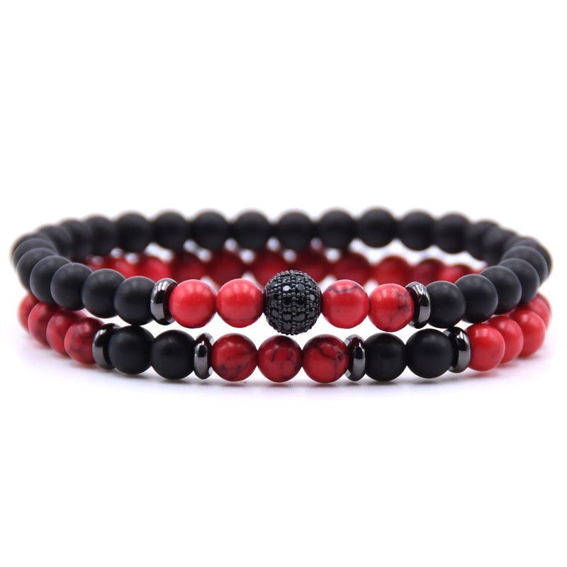 Detail close-up of red and black natural stone beaded bracelet with micro-inlaid zircon, chic minimalist accessory.