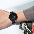 Front view of the black multifunctional watch with minimalist design, a versatile addition to any capsule wardrobe.