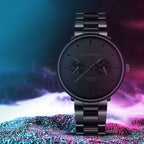 Other view of the black multifunctional watch with a vibrant background, highlighting its stylish design.
