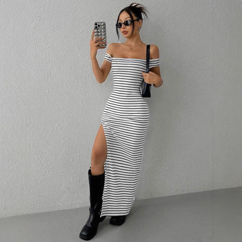 Lifestyle image of a black and white off-shoulder striped dress, emphasizing its stylish design.
