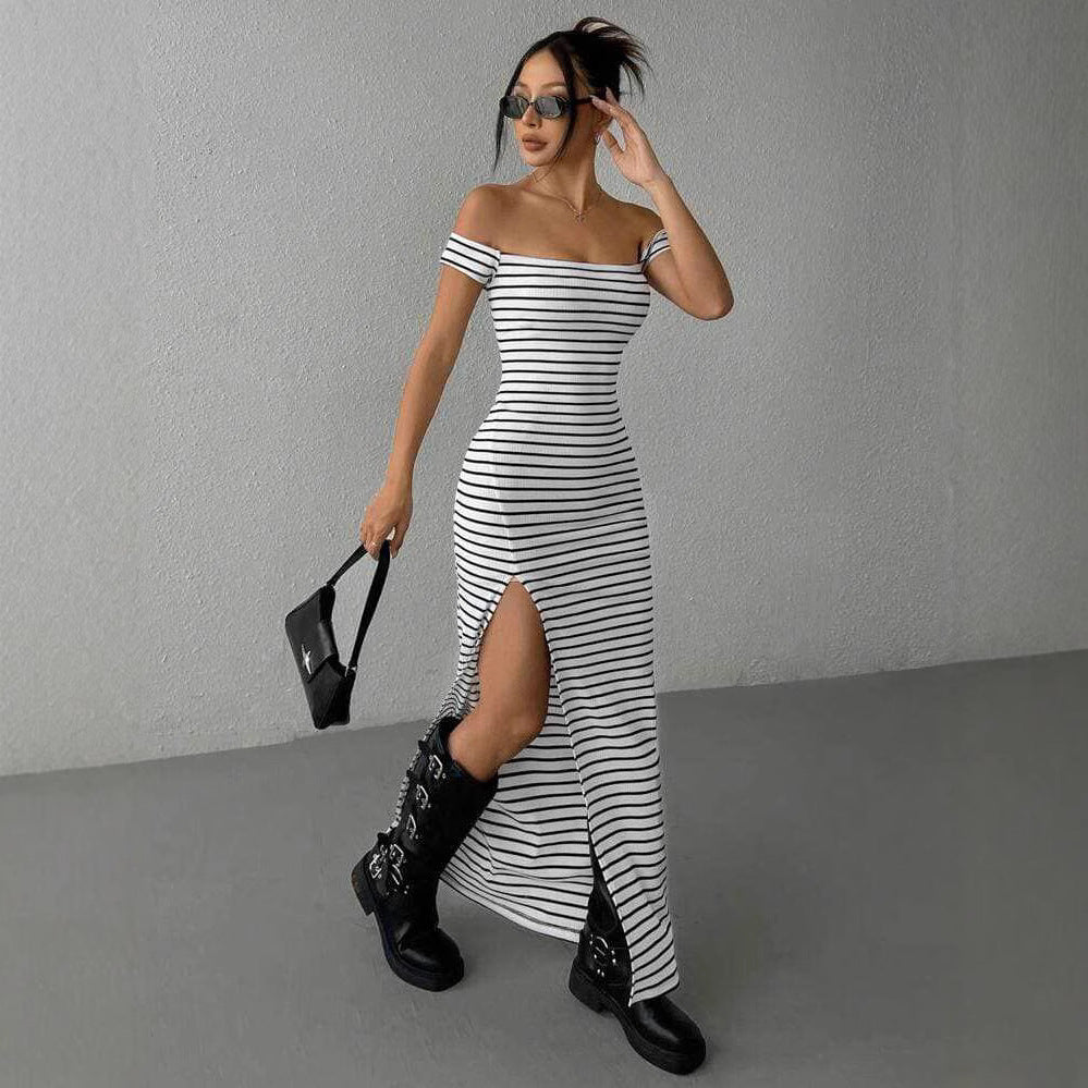 Lifestyle view of an off-shoulder striped dress in black and white, showcasing its elegant silhouette.